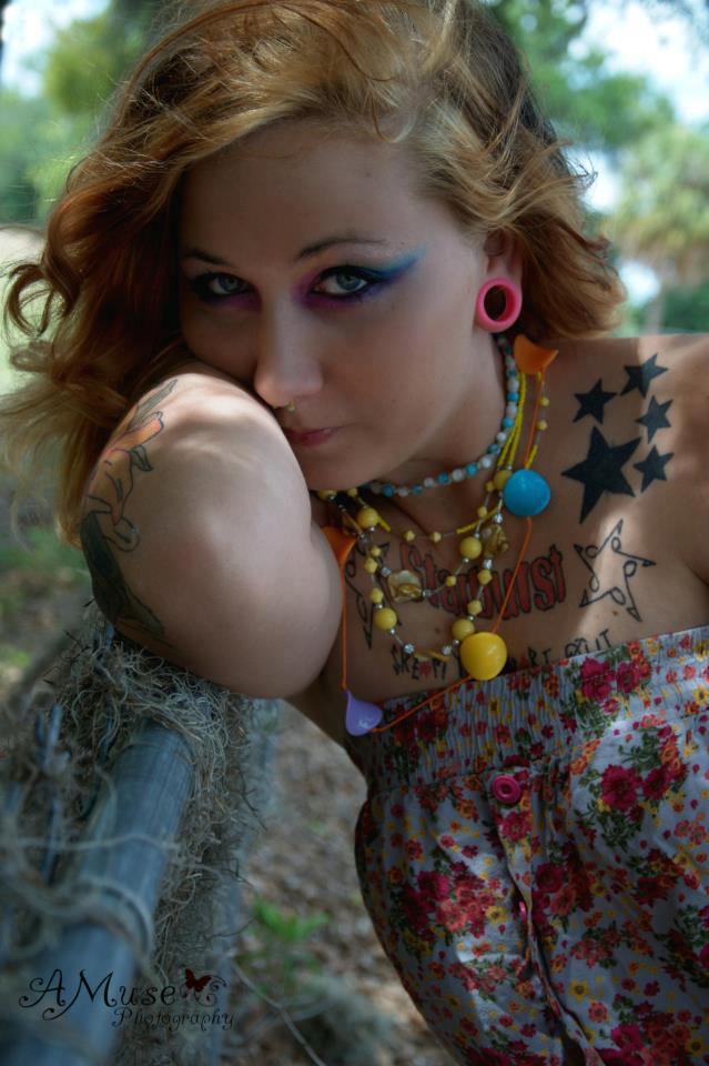 Female model photo shoot of starburst in Ocala Florida