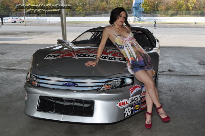 Female model photo shoot of Mizz MYA in Memphis International Raceway
