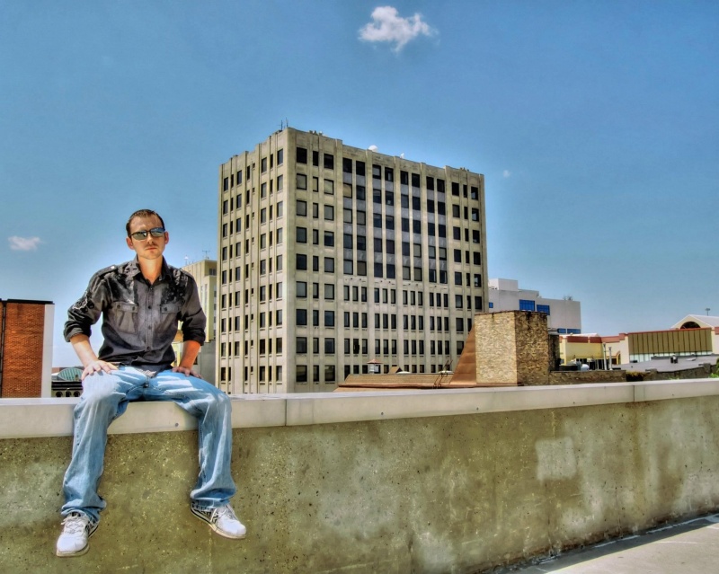 Male model photo shoot of Joseph Posorski by Saylea Photography in Downtown Parking Plaza, Appleton, WI