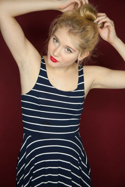 Female model photo shoot of Poppy Mills in Toronto, ON