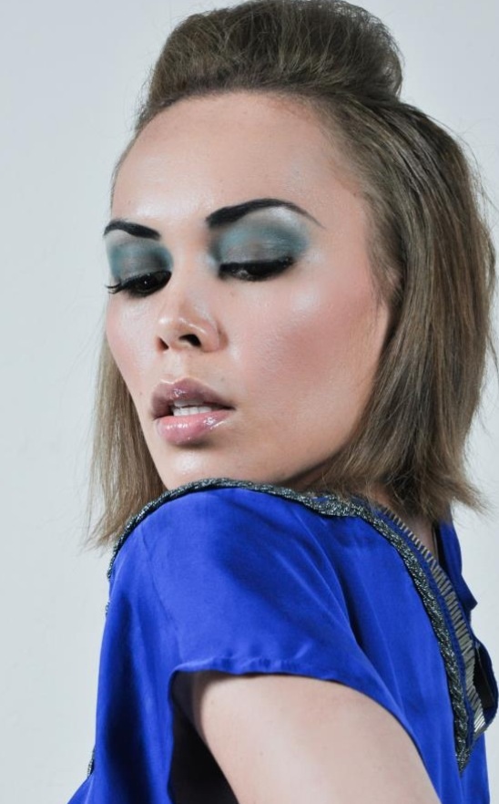 Female model photo shoot of Makeup by Helen 