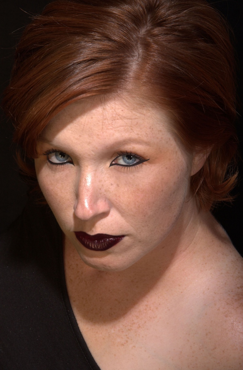 Female model photo shoot of Debonnaire Makeup