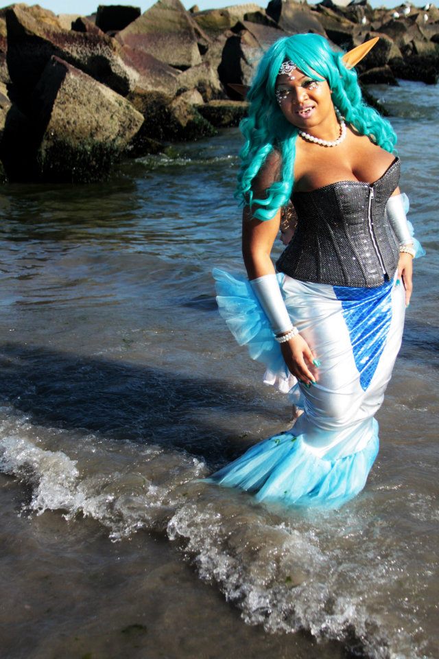Female model photo shoot of LilHevn  and Geisha Vi in Coney Island Mermaid Parade