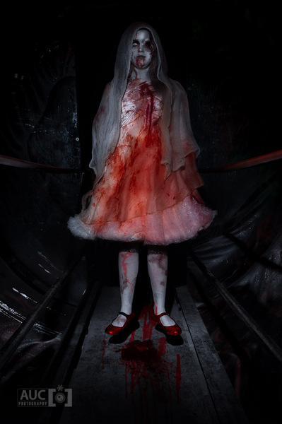 Female model photo shoot of tara by AUC photography in Pure Terror Screampark, Chester, NY