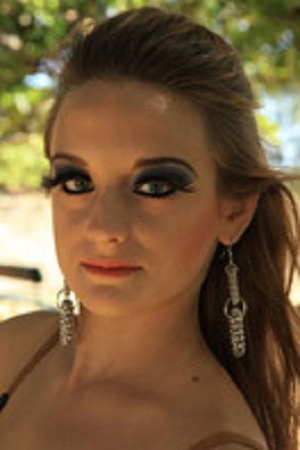 Female model photo shoot of Elegant Makeup