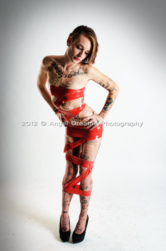 Female model photo shoot of Tattooed cutie by Angel Dreams in ottawa