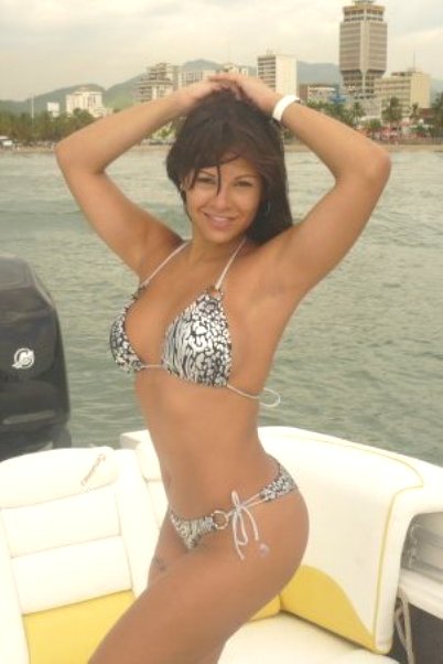 Female model photo shoot of Dim Fazim in boat