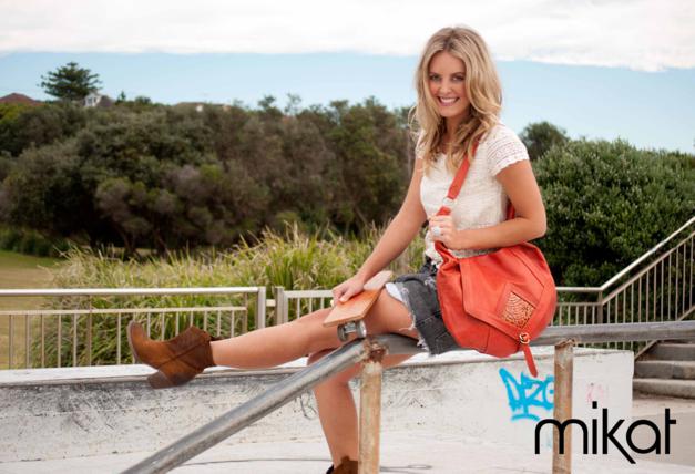 Female model photo shoot of Mikat Accessories in Maroubra Beach NSW