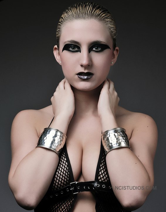 Female model photo shoot of Unleashed Inc by NCISTUDIOS