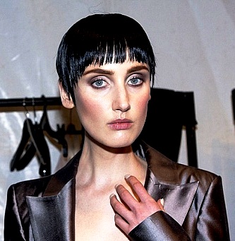Female model photo shoot of LaurenSymons in Carl Kapp - Mercedes Benz Fashion Week 2012