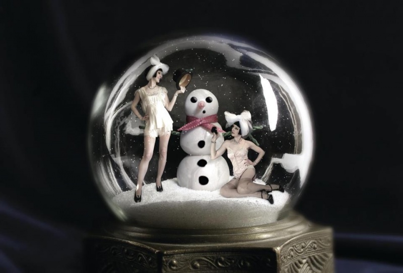 Female model photo shoot of The Poubelle Twins in Inside a Snow Globe