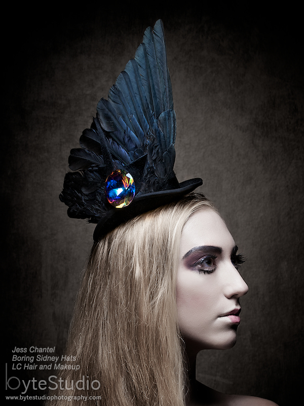 Female model photo shoot of Boring Sidney Hats by ByteStudio, clothing designed by Kimmi Designs8