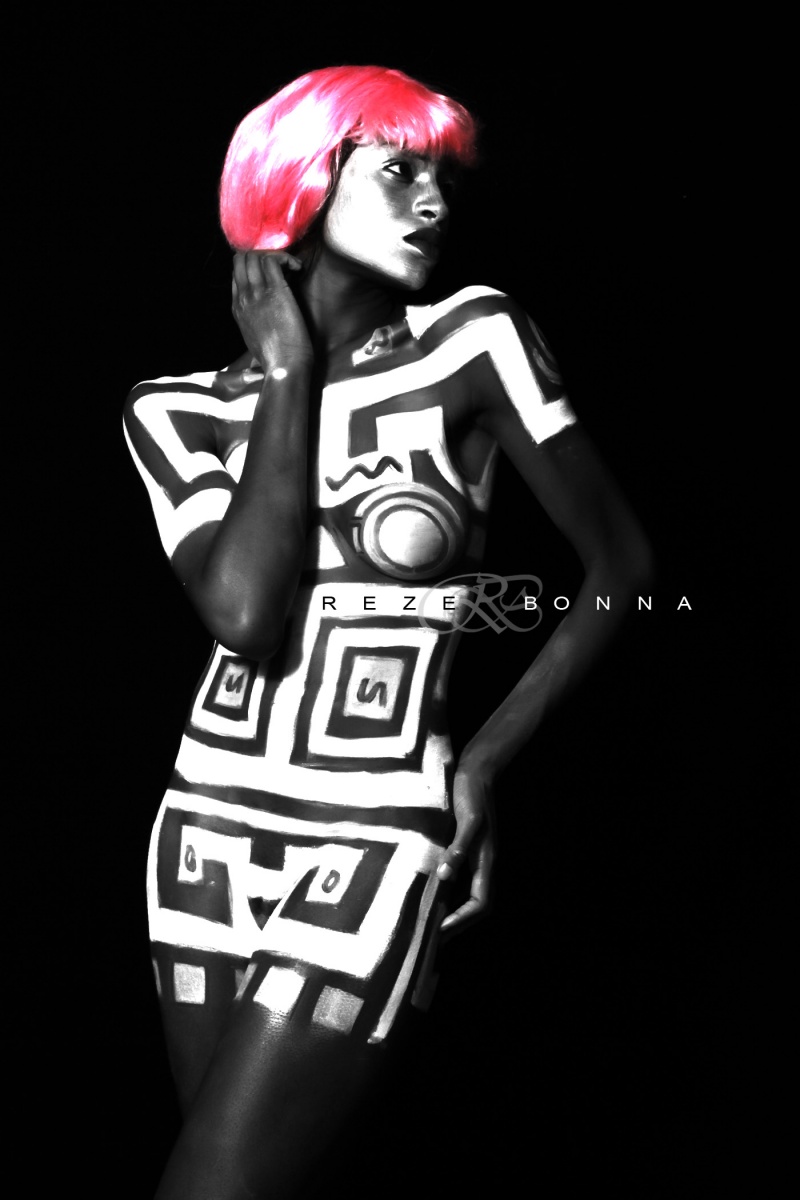 Female model photo shoot of Nneka E by Reze Bonna Photography, body painted by reze Bonna bodyarts