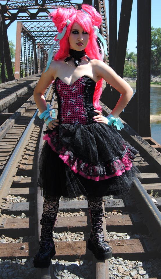 Female model photo shoot of MissBunni in train bridge, Wealthy and Fifth st
