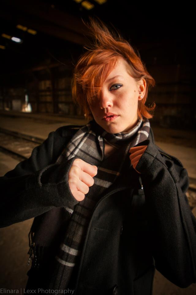 Female model photo shoot of Elinara  in Pullman Rail Yard