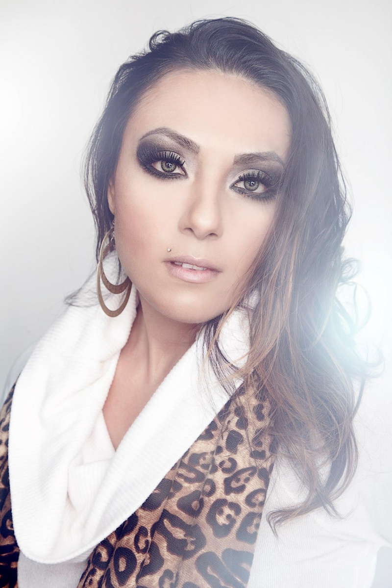 Female model photo shoot of Divine Make-up Artistry