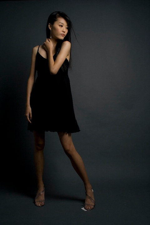 Female model photo shoot of huanchantelle in photo studio
