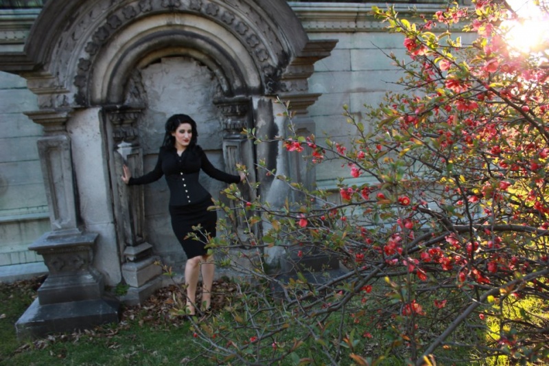 Female model photo shoot of DeDe Devlin in oakwood cemetery