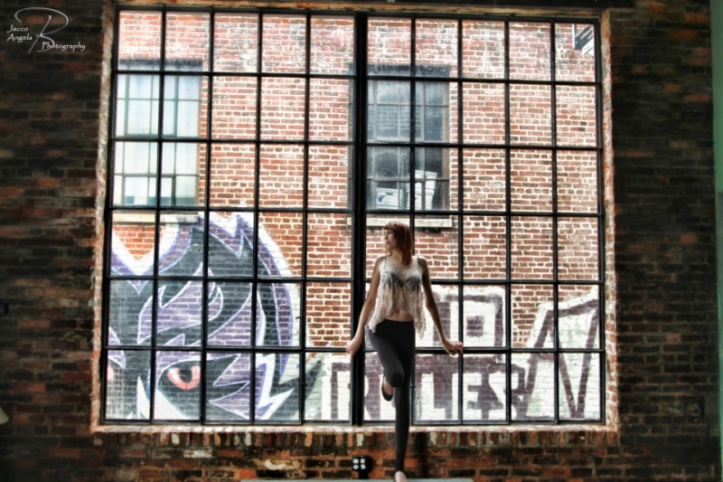Female model photo shoot of Jessica L Jackson in graffiti warehouse baltimore