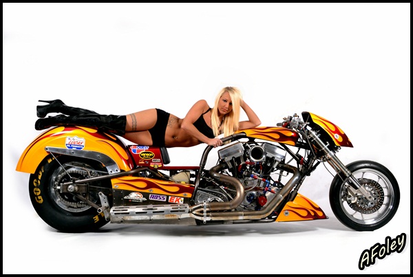Female model photo shoot of Ashley - HK Studio in Interstate Junction Motorcycles in Albert Lea, MN