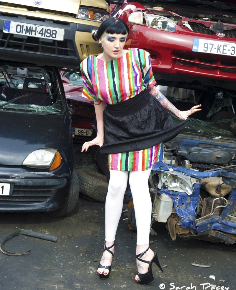 Female model photo shoot of Sarah Tracey Photo in Car Junk Yard
