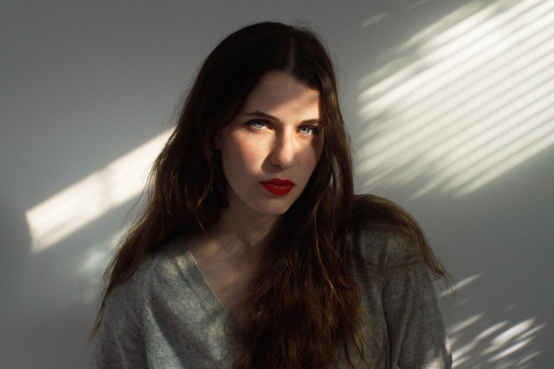 Female model photo shoot of Caroline Danger by Armin Adams Photography in Venice CA