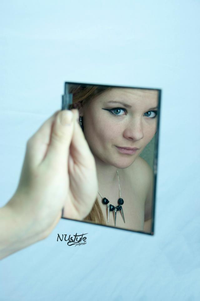 Female model photo shoot of NUstylePhotography in Studio