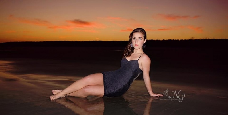 Female model photo shoot of Necessary Photography in Huntington beach