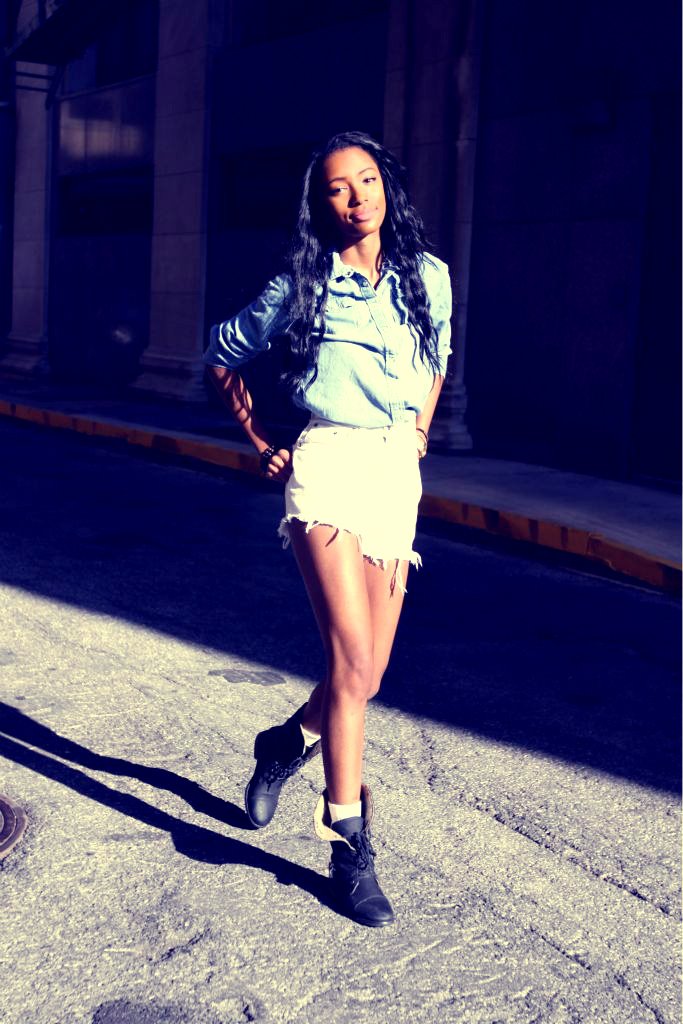 Female model photo shoot of Tanise Robinson in IN downtown