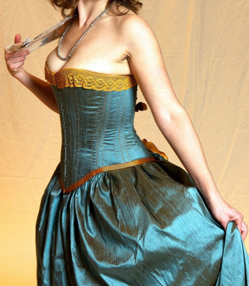 Female model photo shoot of La Belle Fairy Corsets in Cranbrook BC