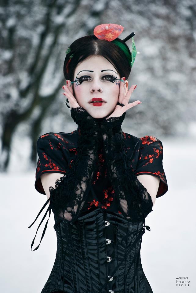 Female model photo shoot of D0ll in surrounded by snow