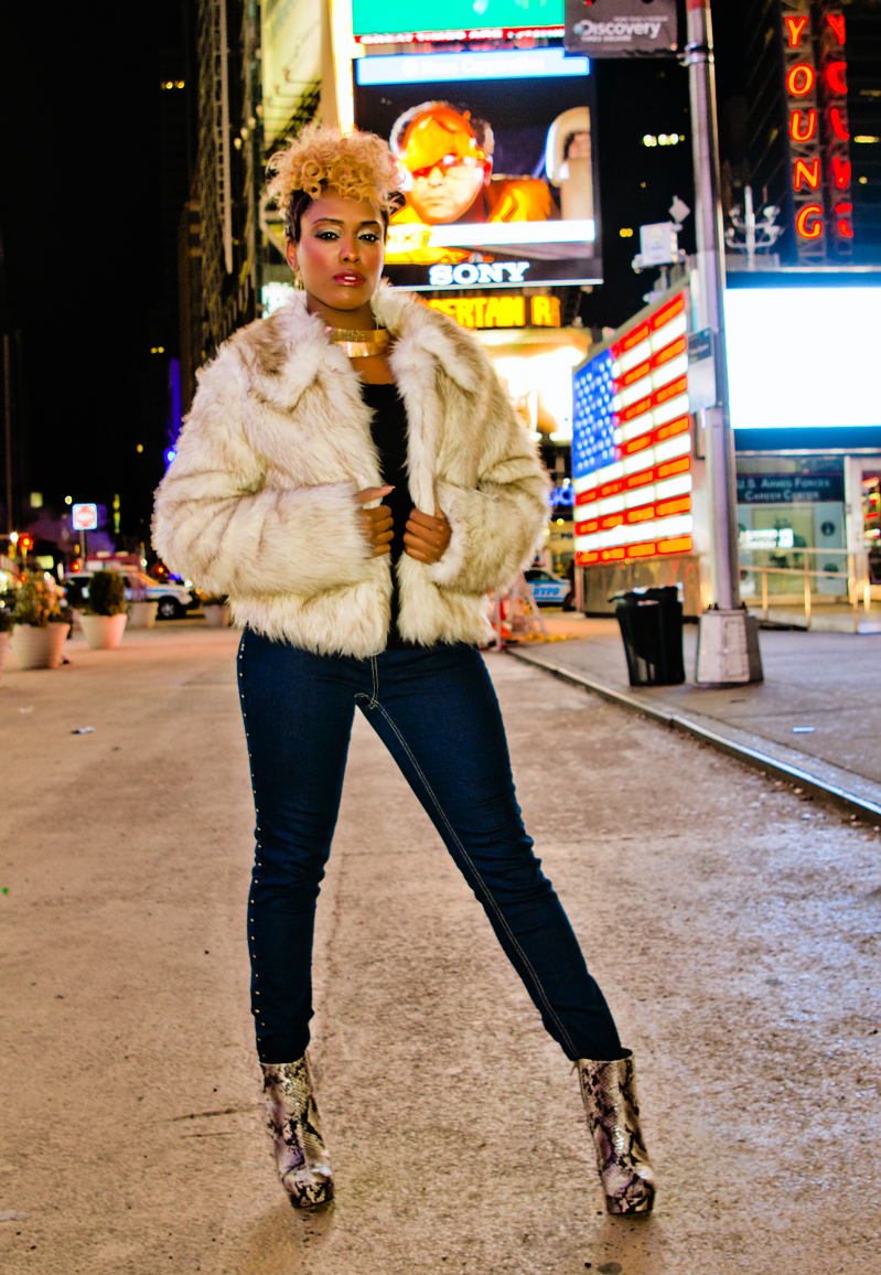 Female model photo shoot of Kimberly Daniels by Port Royal Photography in Times Square