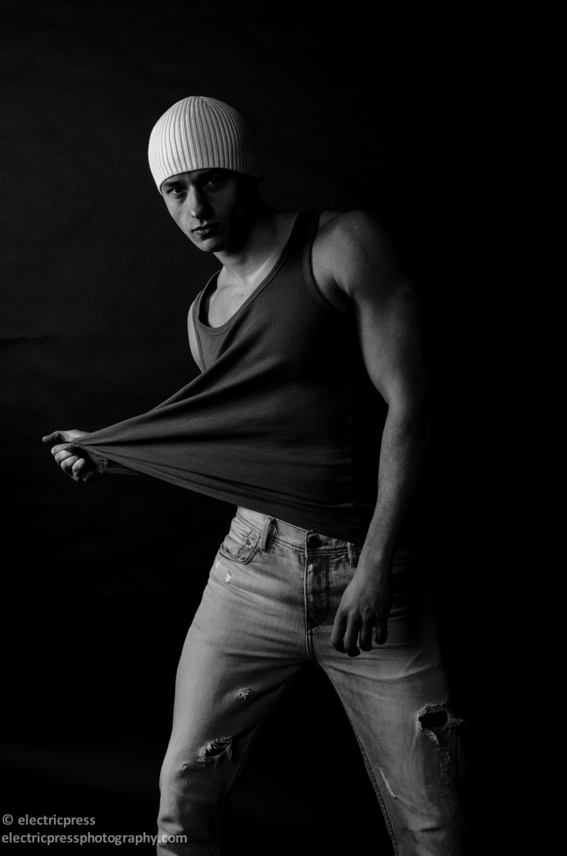 Male model photo shoot of electricpress and Ivan modeling in icandy studio