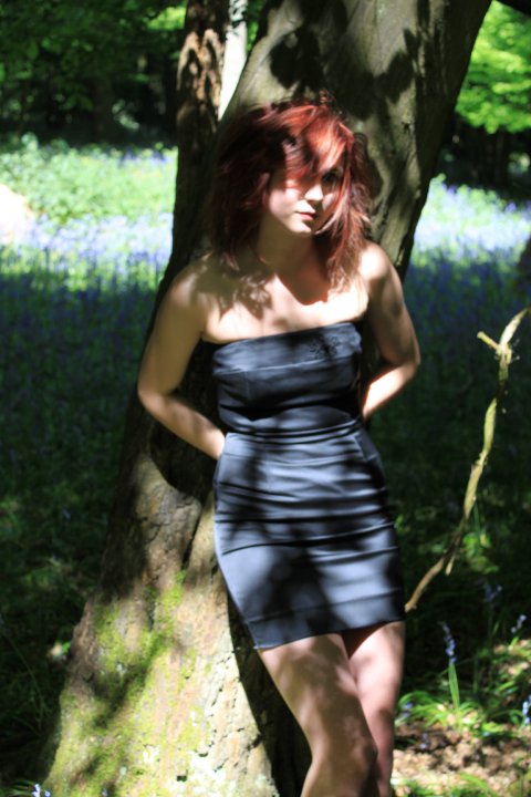 Female model photo shoot of Roxie Oakley in Bluebell wood