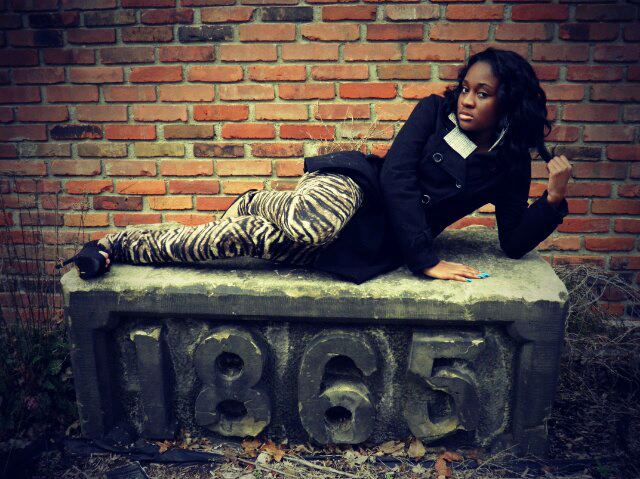 Female model photo shoot of Angela Lively in The Flats in Cleveland Ohio