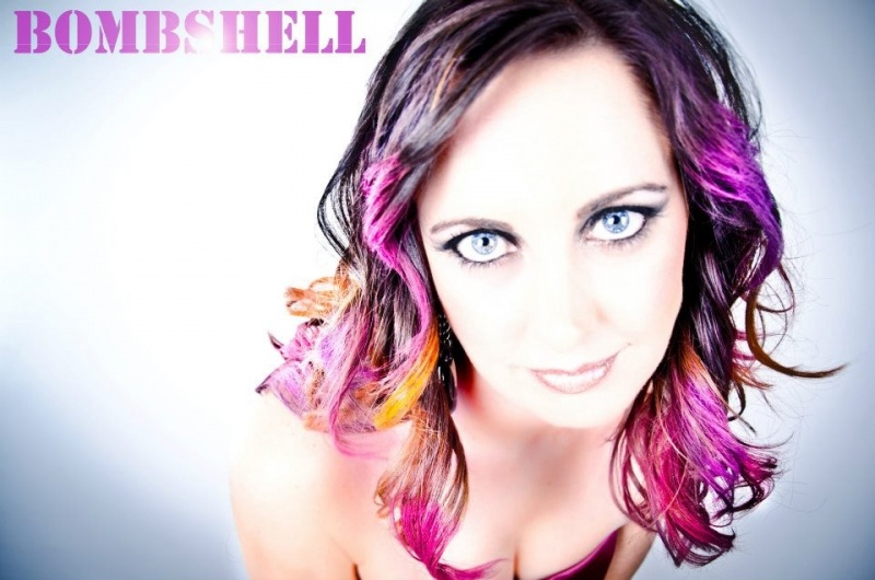 Female model photo shoot of Bombshell Hair Studio 