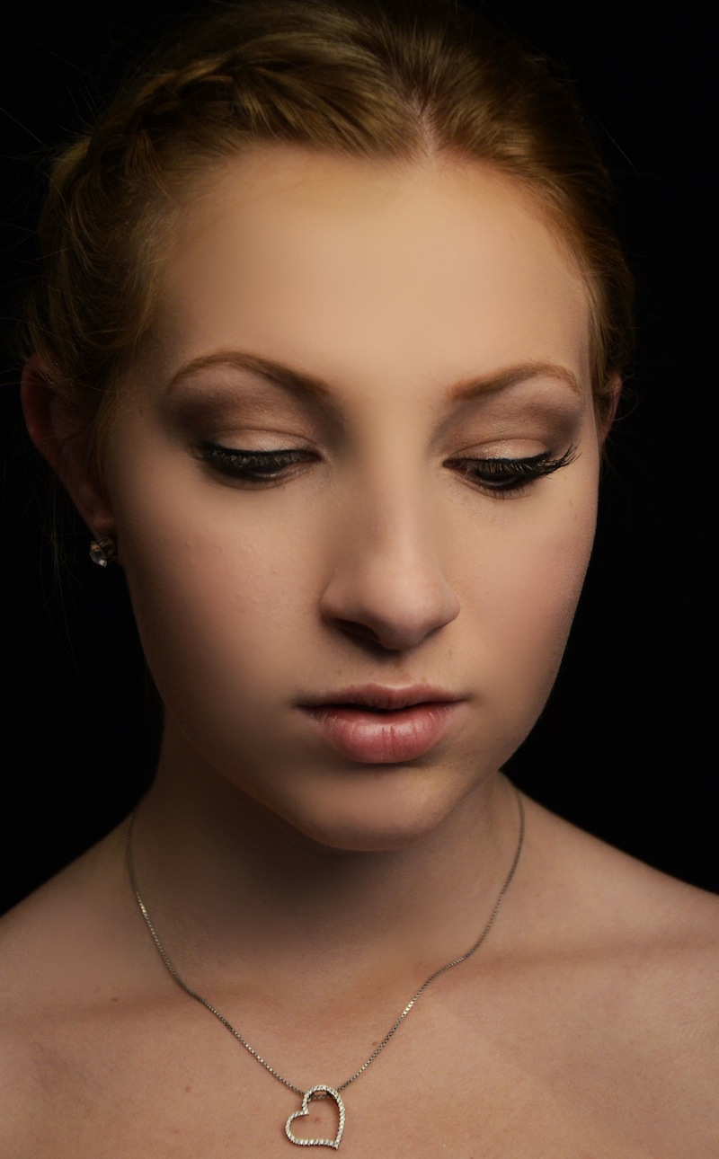 Female model photo shoot of Emily Castro Makeup
