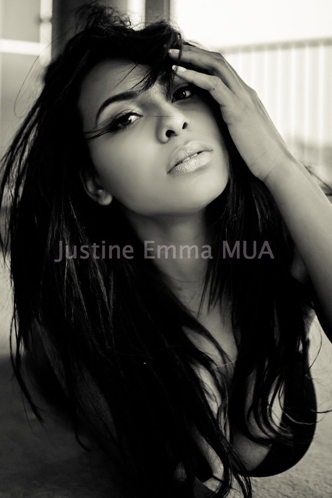 Female model photo shoot of Justine Emma Makeup