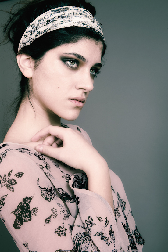 Female model photo shoot of Taryn Makeup