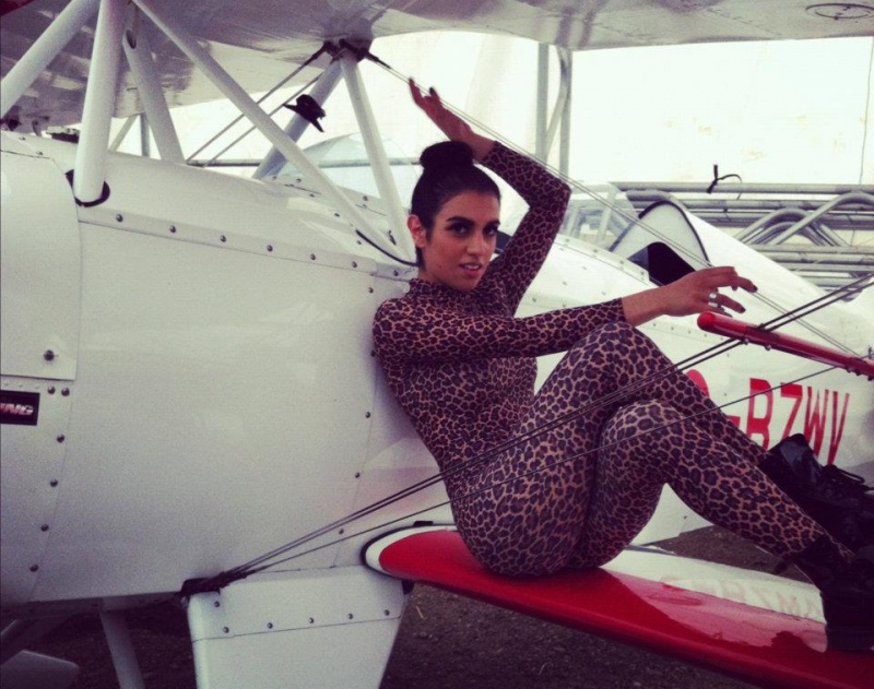 Female model photo shoot of Miss Eleanor in On a plane (video shoot)