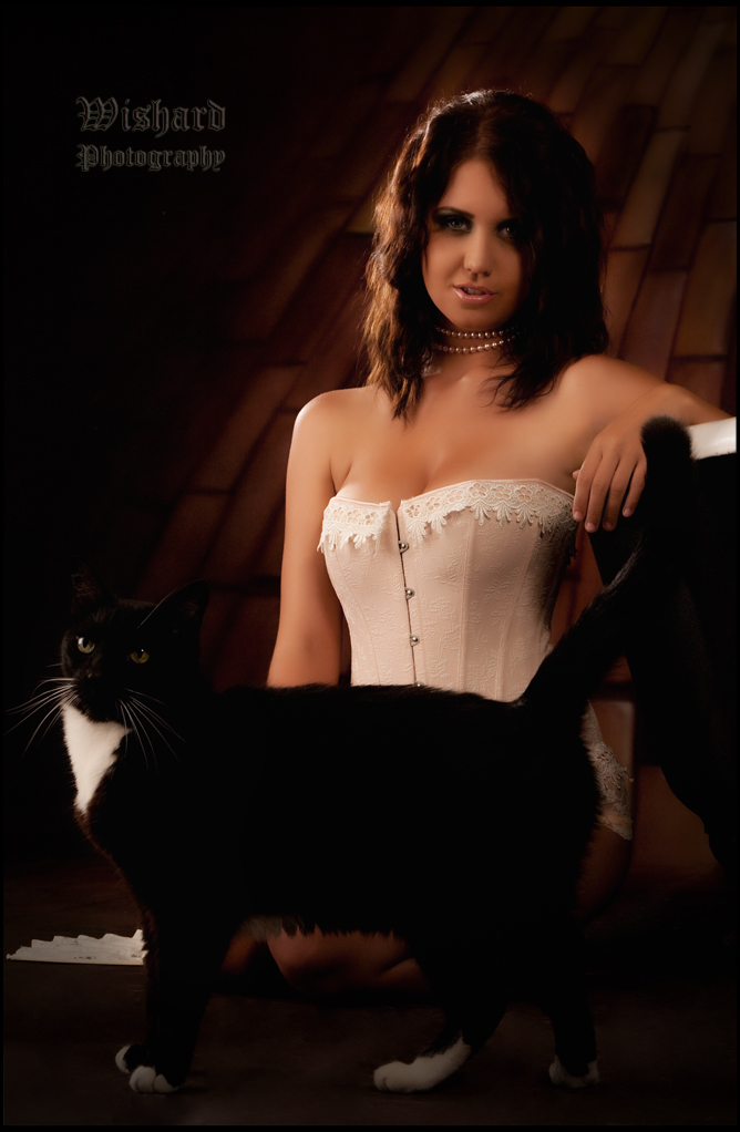 Male and Female model photo shoot of Tuxedo Cat Photo and Chrissy Marie in The Studio