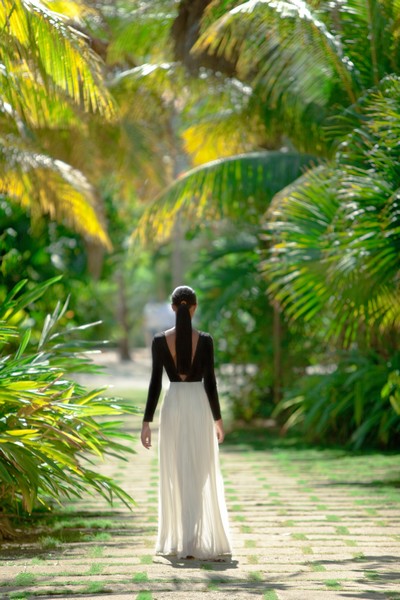 Female model photo shoot of Opulent Couturier in Negril, Jamaica