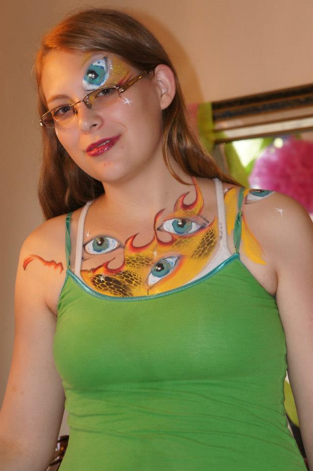 Female model photo shoot of Amy Earle Drake, body painted by a living canvas