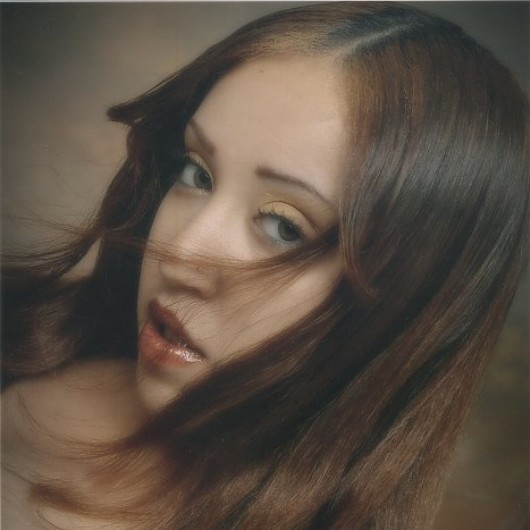 Female model photo shoot of Faces by Rayel