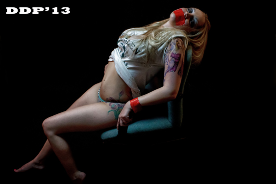 Female model photo shoot of angel ink by Drop Dead Photography