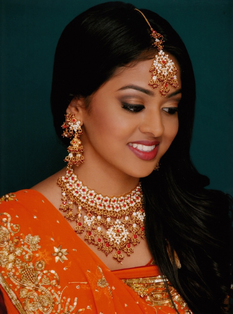 Female model photo shoot of Rathai Siva Makeup Art in George Brown College