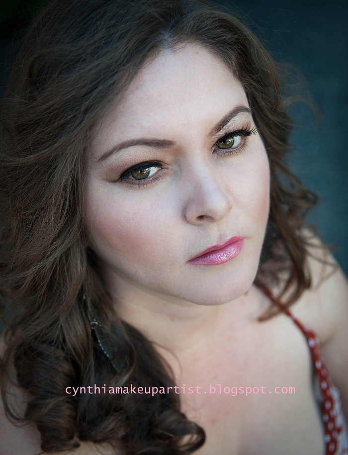 Female model photo shoot of Cynthia MUA and Hair