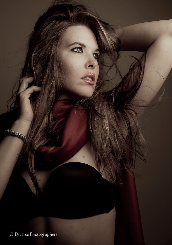 Female model photo shoot of Ashley Ann Whitaker in Diverse Studios