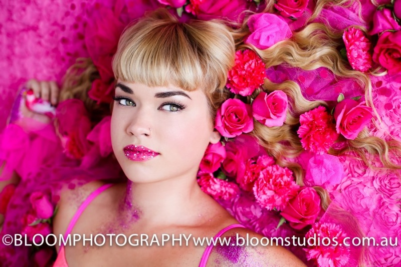 Female model photo shoot of Lips n Lashes by Kylie in Bloom Studios