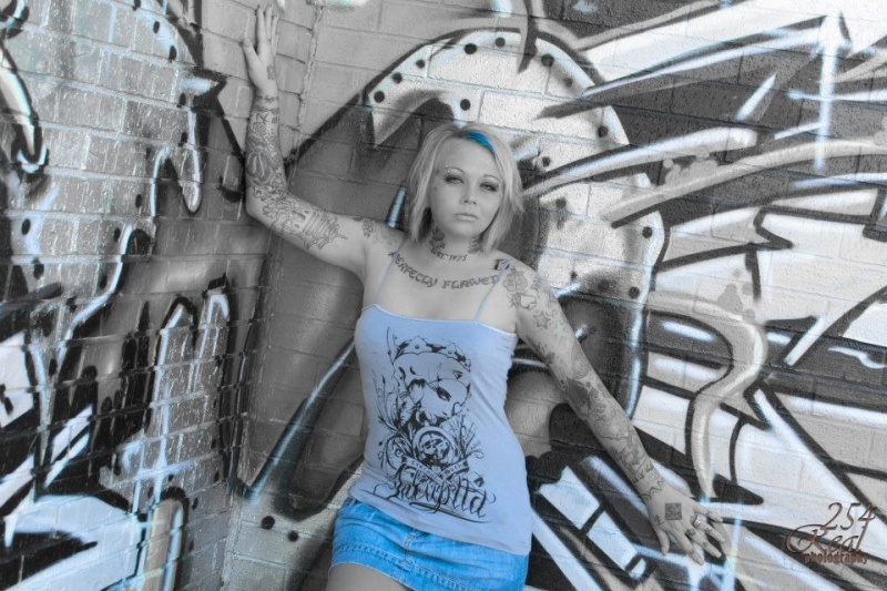 Female model photo shoot of CHARMm in larudes tattoos